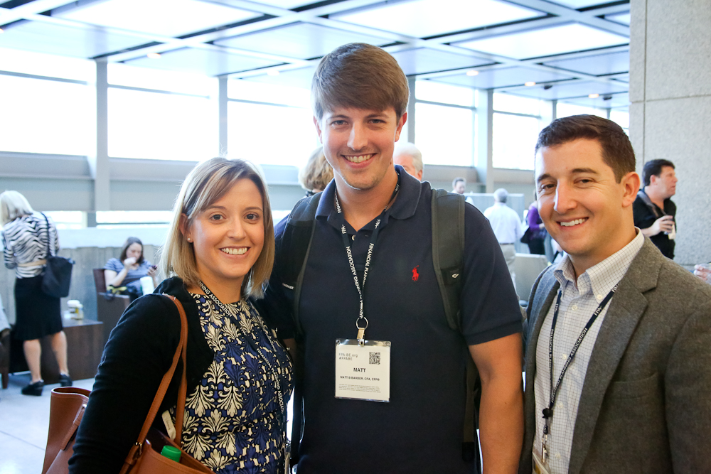 african american woman smiling with collegues in background.jpg